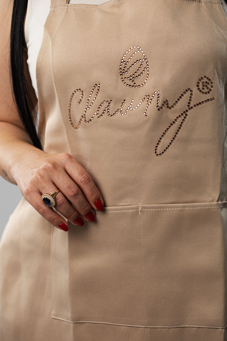 Delantal profesional beige ajustable para manicuristas Claumy®